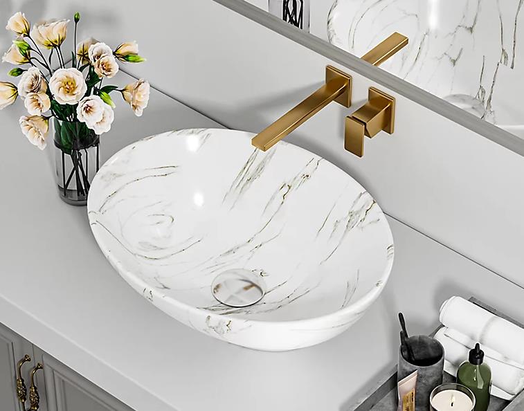 White ceramic countertop basin with modern design and chrome faucet