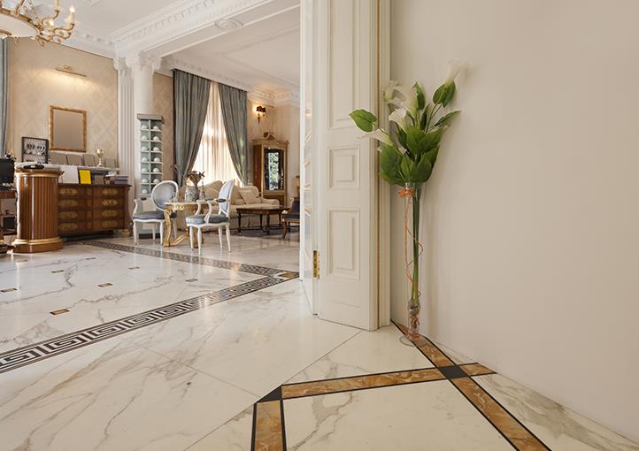 Close-up of a luxurious marble floor design with intricate patterns and textures