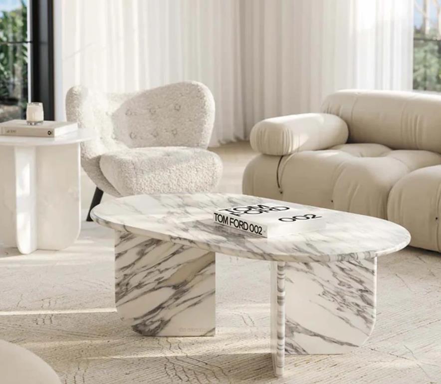 A luxurious marble coffee table with a sleek and elegant design.