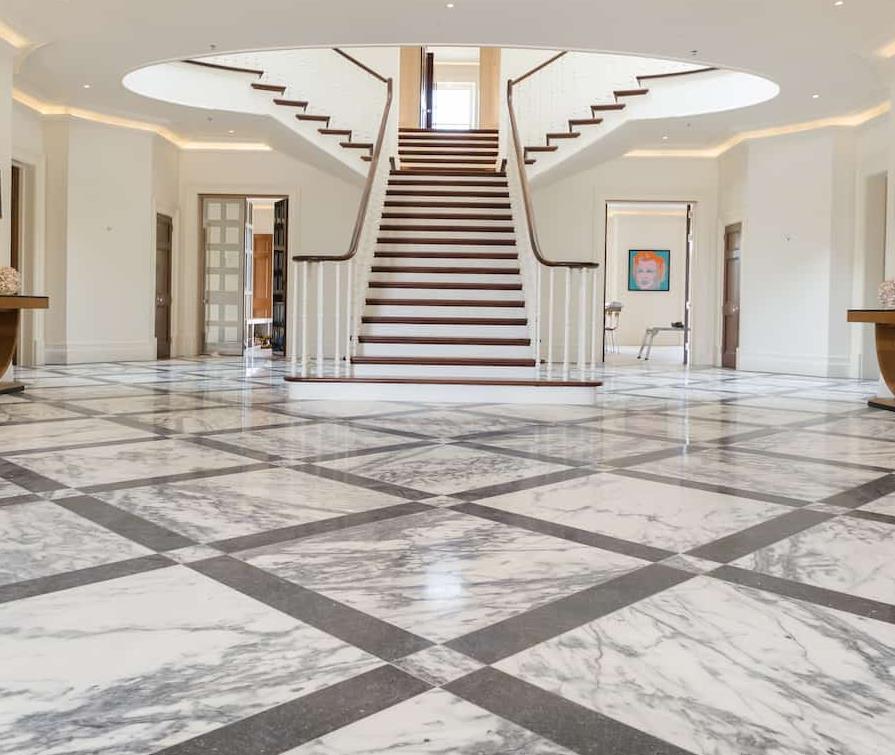 Polished marble floor with intricate veining and glossy finish
