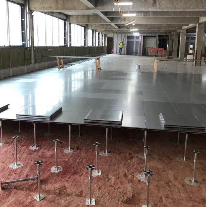 Formero raised floor system with metal panels and adjustable pedestals