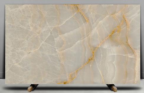 Close up of a polished slab of Onyx Marble with intricate veining and a glossy finish