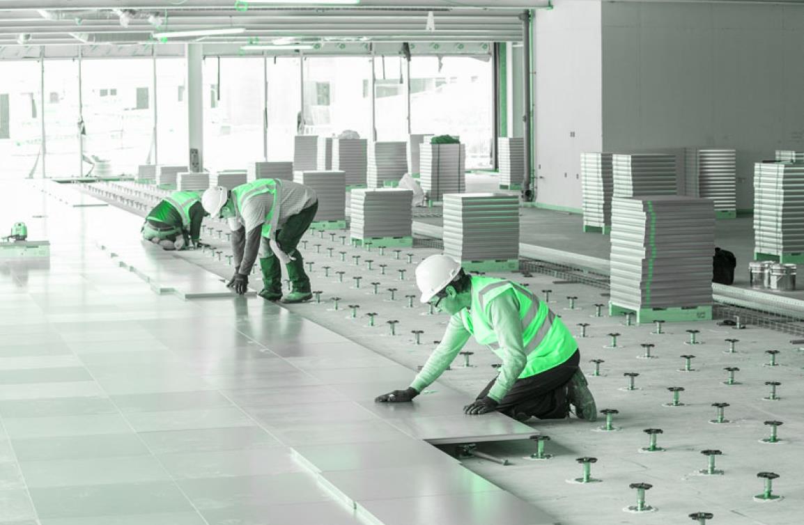Raised floor system supplier showcasing various types of raised floor panels and accessories in UAE