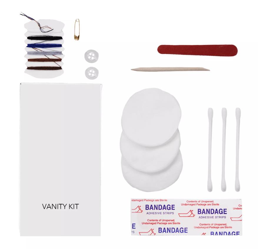 A vanity kit with a mirror, comb, and other grooming tools
