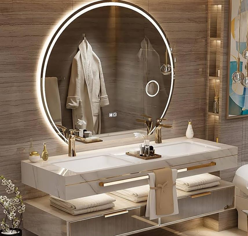 A modern white vanity set with a mirror, stool, and drawers for storing makeup and beauty products.